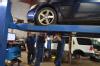 John, Pete, and Jimmy checking engine problems.